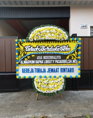 Papan Bunga Duka di Mori Utara